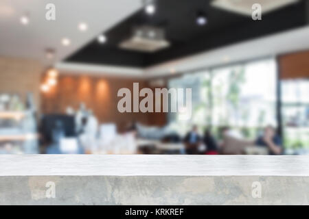 Concrete table top with blurred cafe Stock Photo