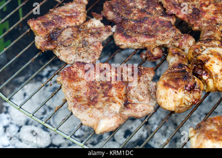barbecue with delicious grilled meat on grill Stock Photo