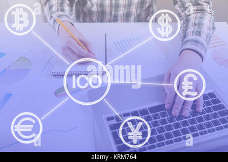 ICO, Initial Coin Offering. Digital electronic binary money financial concept. Bitcoin currency exchange on virtual screen interface. Double exposure Stock Photo