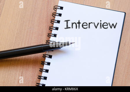 Interview text concept on notebook Stock Photo