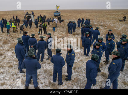 Russian Search and Rescue teams are seen at the Soyuz TMA-18M spacecraft landing site after Expedition 46 Commander Scott Kelly of NASA and Russian cosmonauts Mikhail Kornienko and Sergey Volkov of Roscosmos landed the capsule near the town of Zhezkazgan, Kazakhstan on Wednesday, March 2, 2016 (Kazakh time). Kelly and Kornienko completed an International Space Station record year-long mission to collect valuable data on the effect of long duration weightlessness on the human body that will be used to formulate a human mission to Mars. Volkov returned after spending six months on the station. P Stock Photo