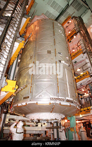 In Atlantis’ payload bay, STS-98 crew member Robert Curbeam practices ...
