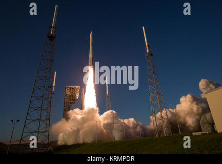 The United Launch Alliance Atlas V rocket carrying NASA's Origins, Spectral Interpretation, Resource Identification, Security-Regolith Explorer (OSIRIS-REx) spacecraft lifts off on from Space Launch Complex 41 on Thursday, Sept. 8, 2016 at Cape Canaveral Air Force Station in Florida. OSIRIS-REx will be the first U.S. mission to sample an asteroid, retrieve at least two ounces of surface material and return it to Earth for study. The asteroid, Bennu, may hold clues to the origin of the solar system and the source of water and organic molecules found on Earth. Photo Credit: (NASA/Joel Kowsky) OS Stock Photo