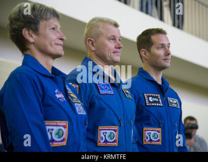 Expedition 50 crew members NASA astronaut Peggy Whitson, left, Russian cosmonaut Oleg Novitskiy of Roscosmos, center, and ESA astronaut Thomas Pesquet are seen ahead of their Soyuz qualification exams, Monday, Oct. 24, 2016, at the Gagarin Cosmonaut Training Center (GCTC) in Star City, Russia. Photo Credit: (NASA/Bill Ingalls) Expedition 50 Qualification Exams (NHQ201610240009) Stock Photo