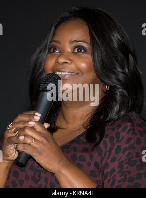 Actress Octavia Spencer, who plays Dorothy Vaughan in the film 'Hidden Figures' speaks at the premiere of the film after a reception to honor NASA's 'human computers' on Thursday, Dec. 1, 2016, at the Virginia Air and Space Center in Hampton, VA. 'Hidden Figures' stars Taraji P. Henson as Katherine Johnson, the African American mathematician, physicist, and space scientist, who calculated flight trajectories for John Glenn's first orbital flight in 1962. Photo Credit: (NASA/Aubrey Gemignani) Octavia Spencer at Hidden Figures premiere Stock Photo