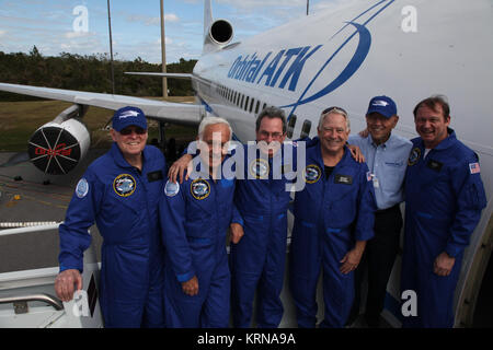 At Cape Canaveral Air Force Station's Skid Strip the crew of the Orbital ATK L-1011 Stargazer aircraft pose for a photograph. From the left are: pilot Ebb Harris, Pilot Bob Gordon, chief pilot Don Walter, flight engineer Bob Taylor, retired chief pilot Bill Weaver and flight engineer Mark Kenny. The Stargazer is being prepared to launch NASA's Cyclone Global Navigation Satellite System, or CYGNSS, spacecraft. The eight micro satellites are aboard an Orbital ATK Pegasus XL rocket strapped to the underside of the Stargazer. CYGNSS is scheduled for its airborne launch aboard the Pegasus XL rocket Stock Photo