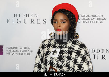 American musical recording artist, actress, and model Janelle Monáe arrives on the red carpet for a screening of the film “Hidden Figures” at the Smithsonian’s National Museum of African American History and Culture, Wednesday, Dec. 14, 2016 in Washington DC. The film is based on the book of the same title, by Margot Lee Shetterly, and chronicles the lives of Katherine Johnson, Dorothy Vaughan and Mary Jackson -- African-American women working at NASA as “human computers,” who were critical to the success of John Glenn’s Friendship 7 mission in 1962. Photo Credit: (NASA/Joel Kowsky) 22Hidden F Stock Photo