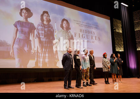 From left: director Theodore Melfi, producer Mimi Valdés,  American singer-songwriter Pharrell Williams, American actor, film director, and producer Kevin Costner, American musical recording artist, actress, and model Janelle Monáe, American actress Octavia Spencer, and American actress and singer Taraji P. Henson, are seen on stage prior to a screening of the film “Hidden Figures” at the Smithsonian’s National Museum of African American History and Culture, Wednesday, Dec. 14, 2016 in Washington DC. The film is based on the book of the same title, by Margot Lee Shetterly, and chronicles the l