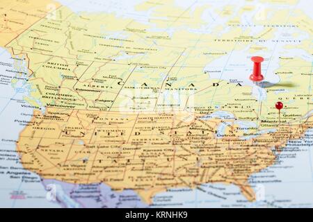 pushpins on map of north america Stock Photo