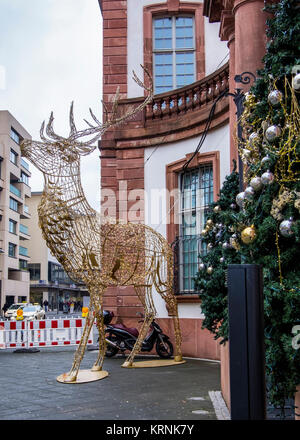 Thurn und Taxis Palais, Reconstruction of 18th century Baroque palace building in Palais Quartier, Historic building entrance and Christmas reindeer Stock Photo