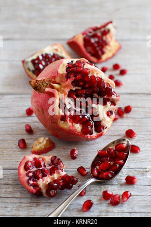 Open fresh ripe pomegranates Stock Photo
