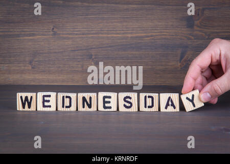 wednesday. Wooden letters on the office desk, informative and communication background Stock Photo