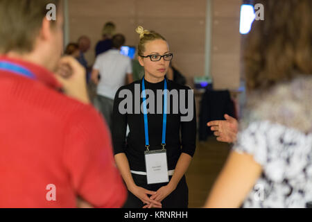 People interacting during coffee break at medical conference. Stock Photo