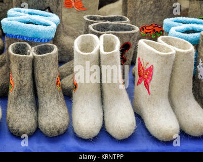 Warm shoes for children made of felt (boots) Stock Photo