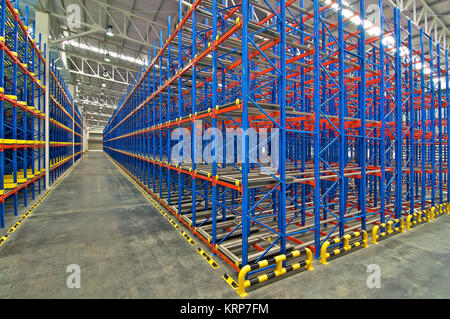 Distribution center warehouse storage pallet racking system Stock Photo