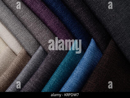 Bright collection of gunny textile samples. Fabric texture background. Stock Photo