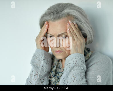 Beautiful sad elderly woman close-up Stock Photo