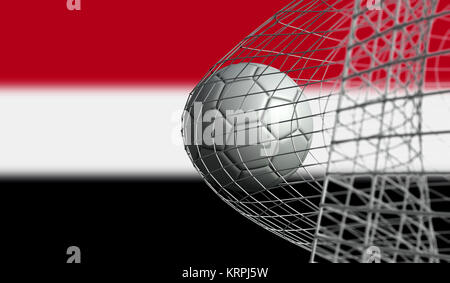 Soccer ball scores a goal in a net against Yemen flag. 3D Rendering Stock Photo