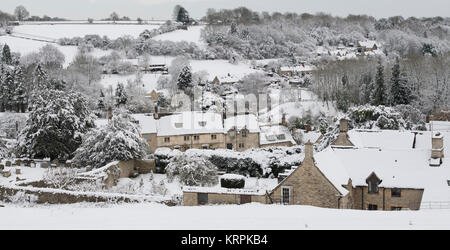 Chedworth village in the december snow. Chedworth, Cotswolds, Gloucestershire, England. Panoramic Stock Photo