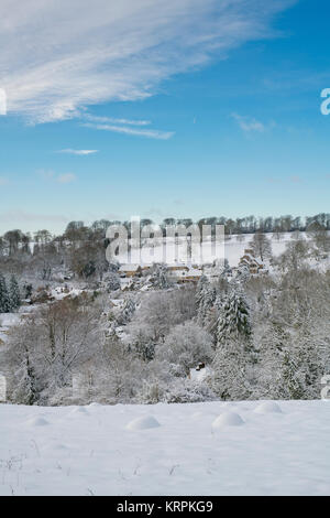 Chedworth village in the december snow. Chedworth, Cotswolds, Gloucestershire, England Stock Photo