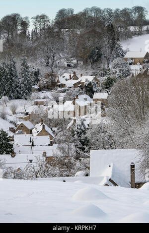 Chedworth village in the december snow. Chedworth, Cotswolds, Gloucestershire, England Stock Photo