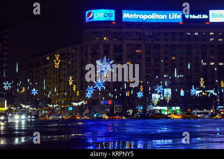 19 December 2017- Bucharest, Romania- Piata Victoriei or the Victory square decorated with festive, Christmas lights Stock Photo