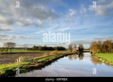 Old shed along the river Giessen near Hoornaar in the Dutch region Alblasserwaard Stock Photo