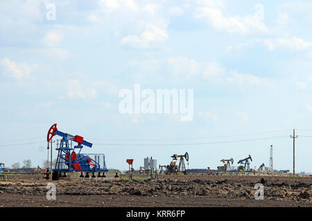 pump jack on oilfield mining industry Stock Photo