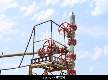 Oil well wellhead equipment. Hand valve with handwheel for opening and closing the flow line. Stock Photo