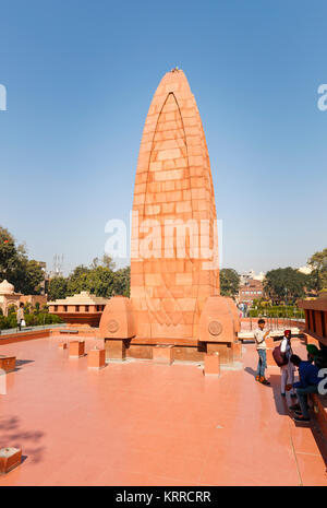 Flame monument at Jallianwala Bagh, a public garden in Amritsar, Punjab, India, a memorial commemorating the 1919 British Jallianwala Bagh Massacre Stock Photo