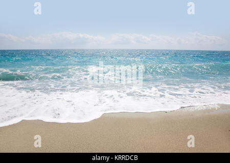 Wave Of Blue Ocean On Sandy Beach Stock Photo