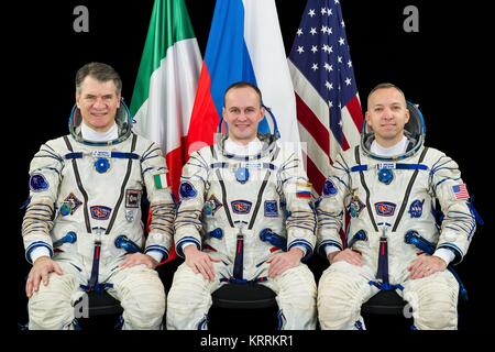 Official portrait of NASA International Space Station Expedition 52-53 prime crew members Italian astronaut Paolo Nespoli of the European Space Agency (left), Russian cosmonaut Sergey Ryazanskiy of Roscosmos, and American astronaut Randy Bresnik at the Johnson Space Center March 13, 2017 in Houston, Texas. Stock Photo