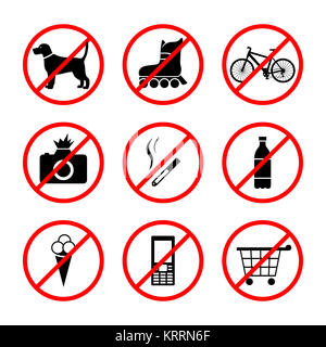 Signs forbidding different actions in various places. Signs are located on a white background. . Stock Photo