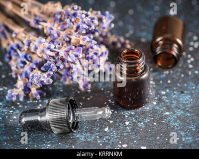essential oil and lavender flowers Stock Photo