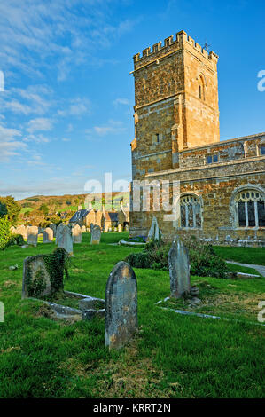 The parish church of St Nicholas, Abbotsbury, Dorset on a spring morning under a blue sky. Stock Photo