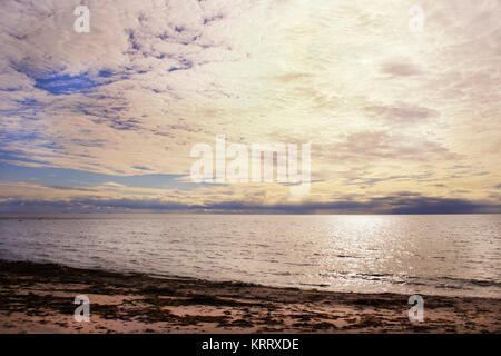 solid square clouds over the sea, a storm on the horizon Stock Photo