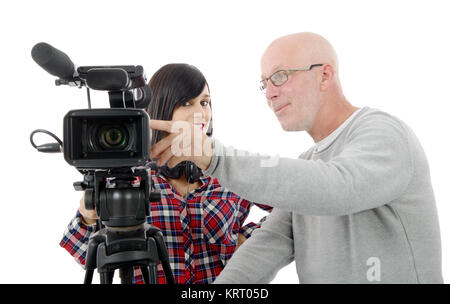 young woman cameraman, and the mature man Stock Photo