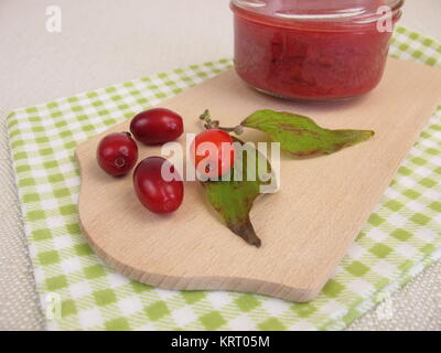 homemade cornel cherry jam in the glass Stock Photo