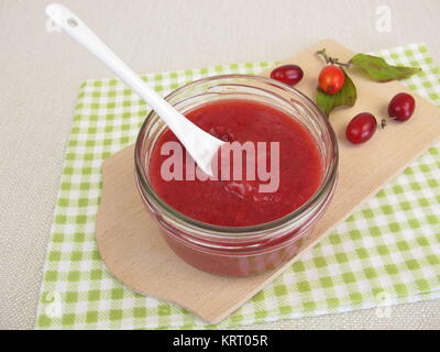 homemade cornel cherry jam in the glass Stock Photo