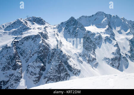 Winter snow covered mountain peaks in Austrian alps. Great place for winter sports Stock Photo