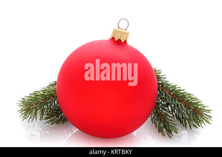 Christmas beautiful shiny ball and spruce sprigs on white Stock Photo