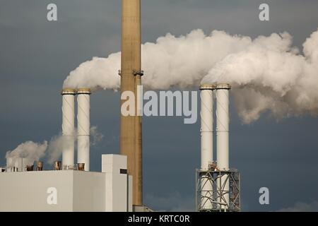 Smoking power plant Stock Photo