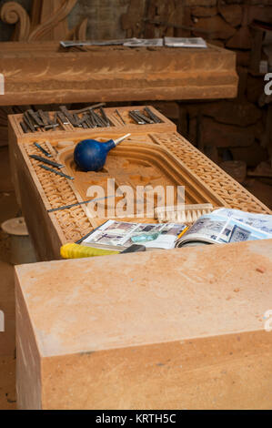 Armenian khachkar workshop, Yerevan, Armenia, October 2012:  carving Armenian cross stones at workshop in Yerevan. Stock Photo