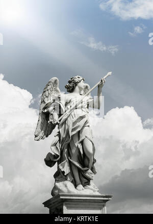 Beautiful Angel sculpture in Rome with an incredible dramatic cloudy sky on the background Stock Photo