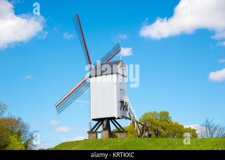 Windmill in Bruges, Northern Europe, Belgium. Historical building preserved for tourism in the city, along the canals. Stock Photo