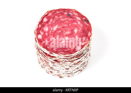 Slices of salami sausage on a white background Stock Photo