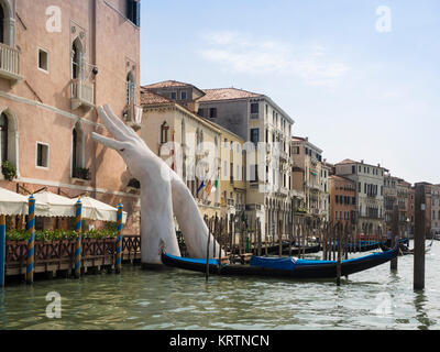 VENICE, ITALY - SEPTEMBER 13, 2017:  Sculpture (titled SUPPORT) by Lorenzo Quinn for the 2017 Venice Biennale. Stock Photo