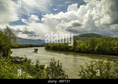 Little cottage on the rock before storm in the Drina river in Bajina Basta, Serbia. HDR effect Stock Photo