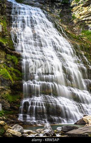 cascada cola de caballo waterfall under monte perdido ordesa valley at aragon huesca pyrenees of spain Stock Photo