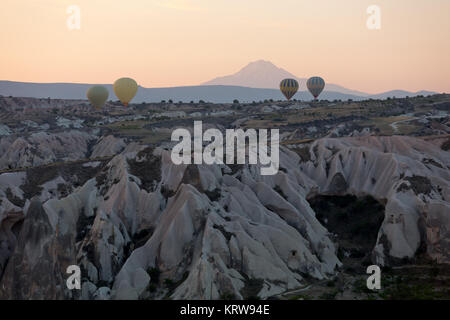 Hot Air Baloons over Cappadocia at sunrise Stock Photo